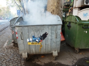 Smoking trash bin that no one bothered to do anything about